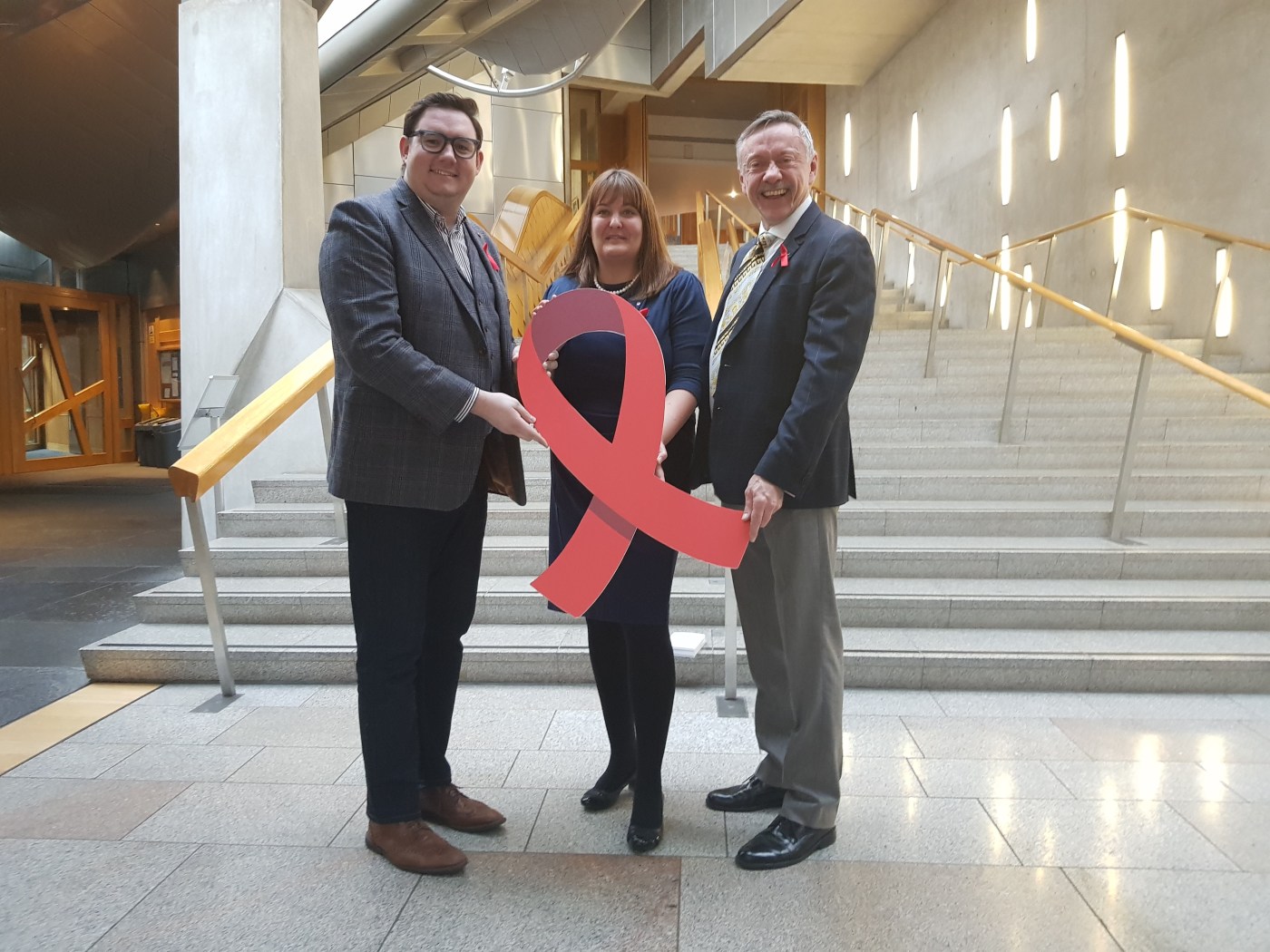 Ruth Maguire MSP with representatives from HIV Scotland in 2018
